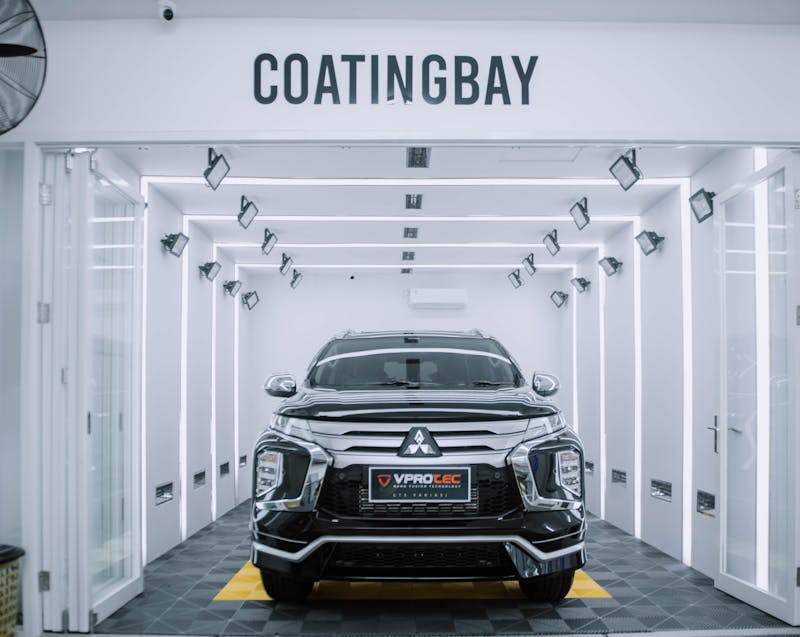 a car on the coating bay